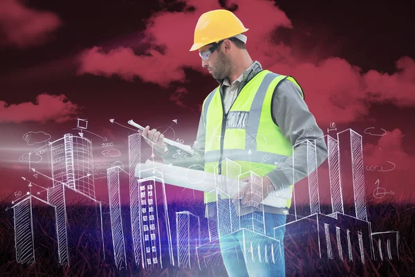 Casual architect holding blueprint — Stock Photo, Image