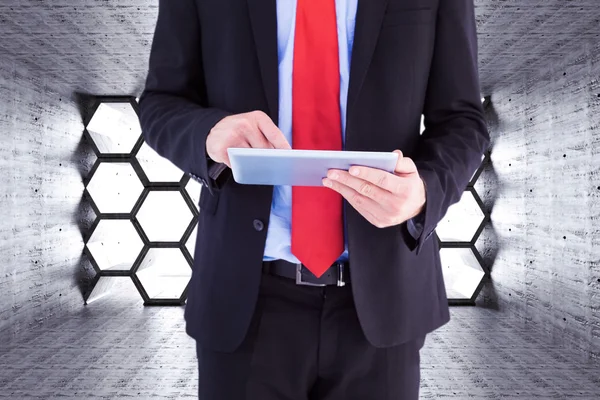 Businessman scrolling on digital tablet — Stock Photo, Image