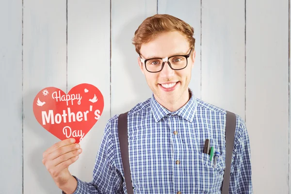 Hipster holding a heart card — Stock Photo, Image