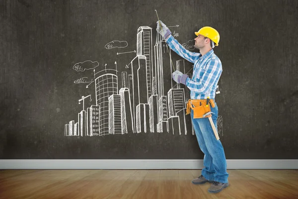 Construction worker using measure tape — Stock Photo, Image