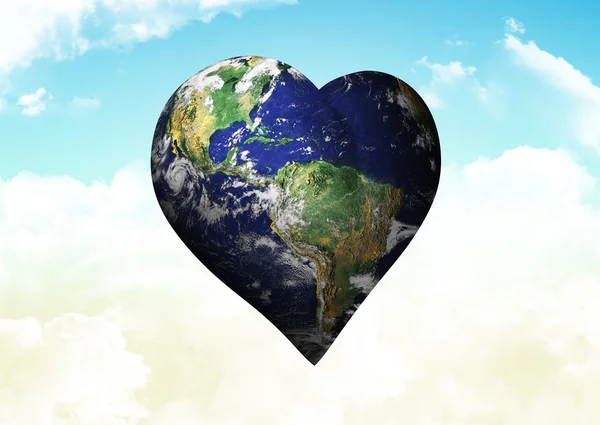 Composite image of heart shaped earth — Stock Photo, Image