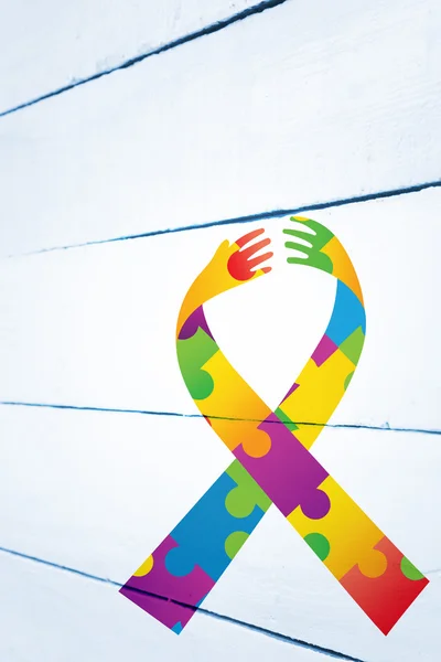 Sammansatt bild av autism awareness ribbon — Stockfoto