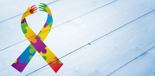 Composite image of autism awareness ribbon — Stock Photo, Image