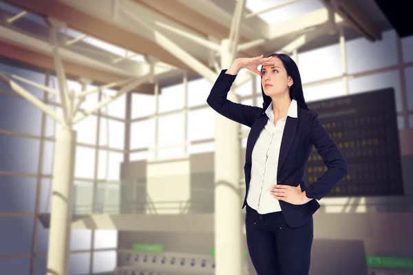 Mujer de negocios bonita mirando con la mano arriba — Foto de Stock