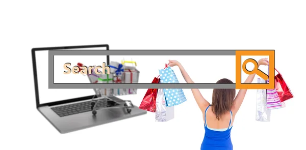 Brunette woman raising shopping bags — Stock Photo, Image