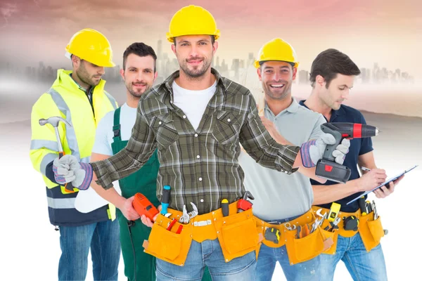 Handyman wearing tool belt — Stock Photo, Image