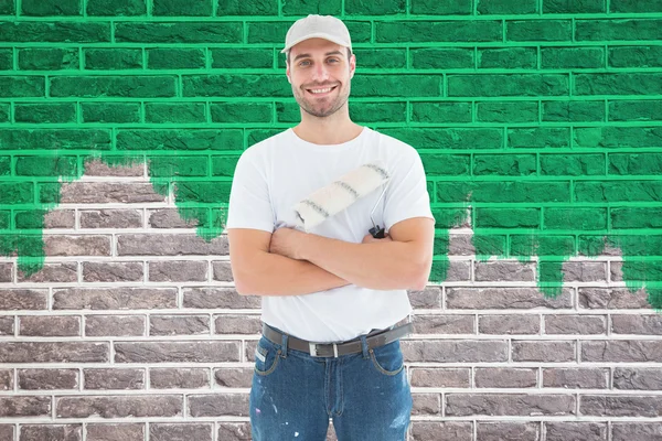 Happy man with paint roller — Stock Photo, Image