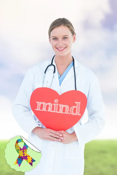 Word mind and doctor holding card — Stock Photo, Image