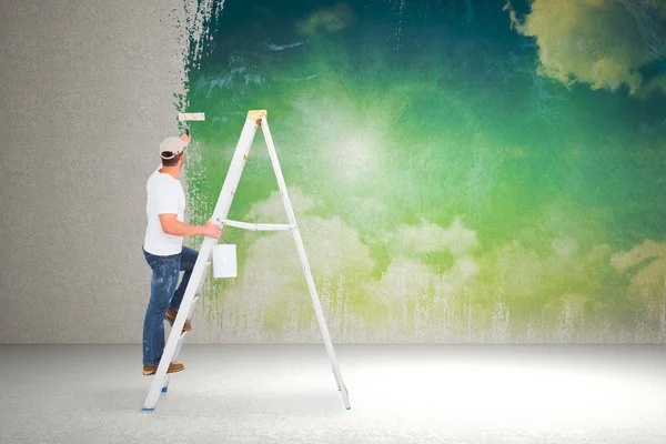 Handyman climbing ladder — Stock Photo, Image