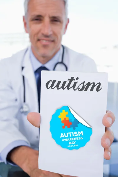 Male doctor showing a blank — Stock Photo, Image