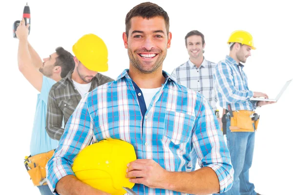 Tamirci holding hardhat ve çekiç — Stok fotoğraf