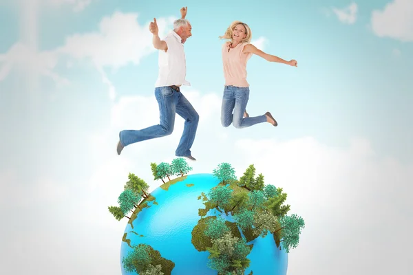 Excited couple cheering and jumping — Stock Photo, Image