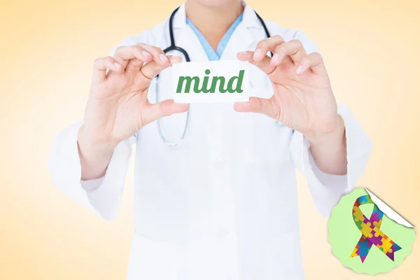 Word mind and doctor holding card — Stock Photo, Image