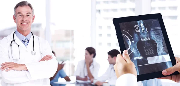 Composite image of man using tablet pc — Stock Photo, Image