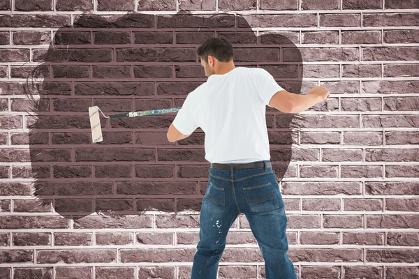 Man using paint roller on white background — Stock Photo, Image