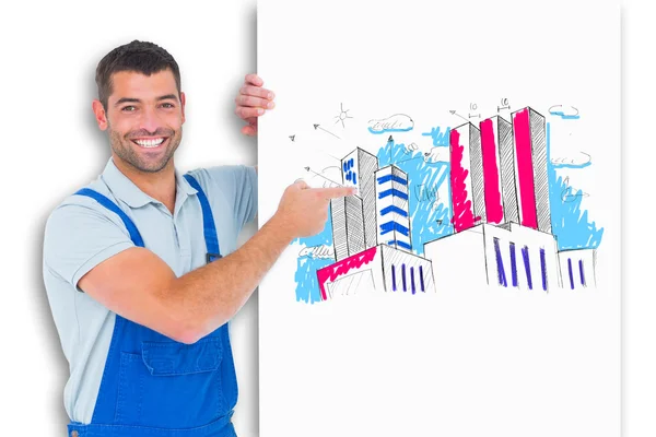 Reparateur in Overalls zeigt auf Plakat — Stockfoto