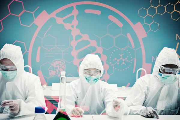 Composite image of chemists working — Stock Photo, Image