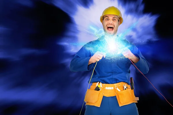 Repairman screaming while holding wires — Stock Photo, Image