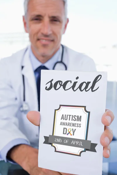 Male doctor showing a blank — Stock Photo, Image