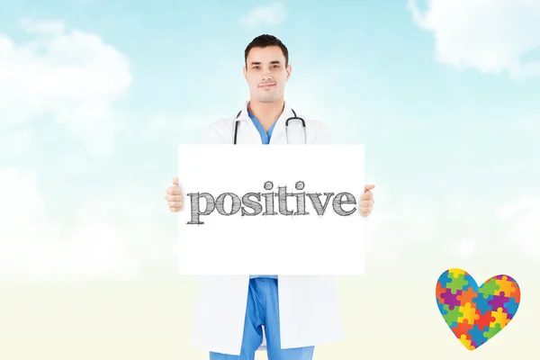 Word positive and portrait of a doctor — Stock Photo, Image