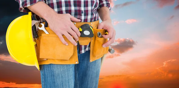 Handyman with tool belt — Stock Photo, Image