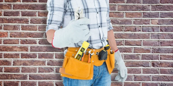 Technician with tool belt — Stock Photo, Image