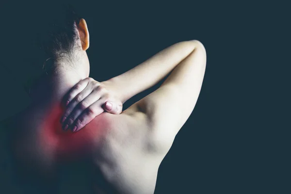Kobieta z uszkodzenia mięśni — Zdjęcie stockowe