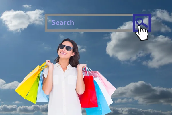 Brunette with shopping bags — Stock Photo, Image