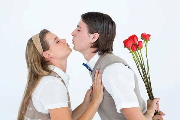 Hipster giving kiss to girlfriend — Stock Photo, Image