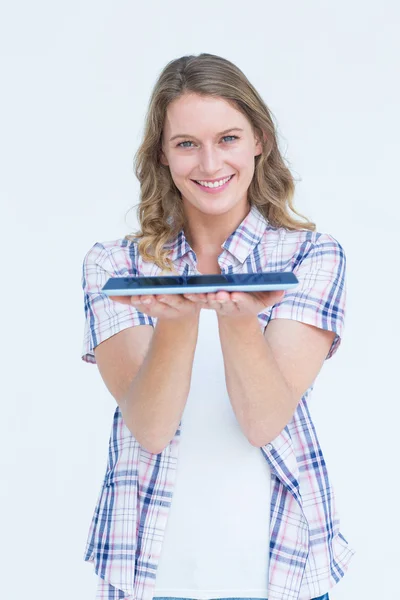 Pretty hipster showing tablet — Stock Photo, Image