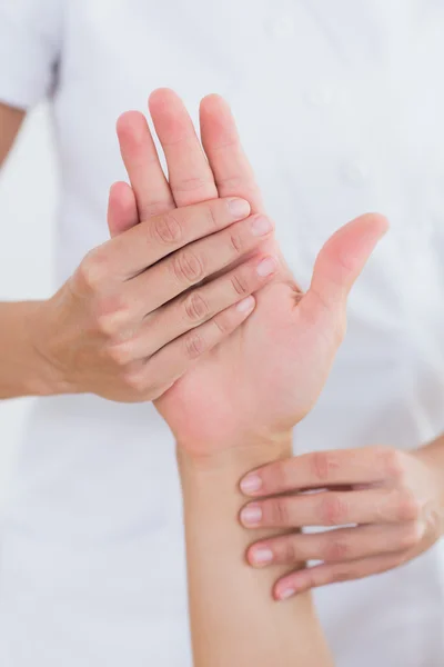 Physiotherapist doing hand massage — Stock Photo, Image