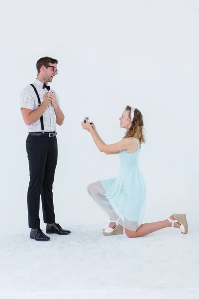 Hipster woman doing a marriage proposal to her boyfriend — Stock Photo, Image