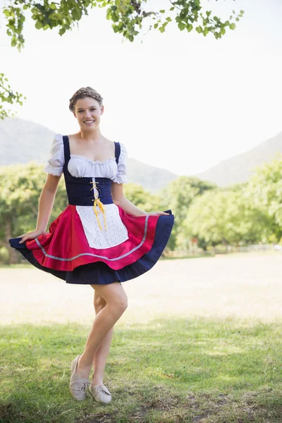 Pretty oktoberfest girl in the park — Stock Photo, Image