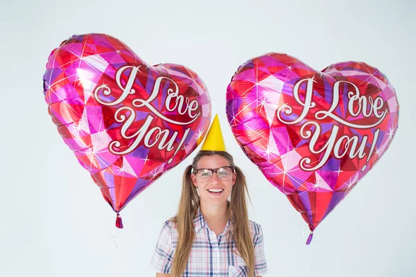 Geeky hipster holding balloons — Stock Photo, Image
