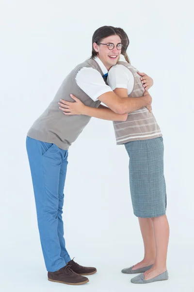 Geeky hipster couple hugging — Stock Photo, Image