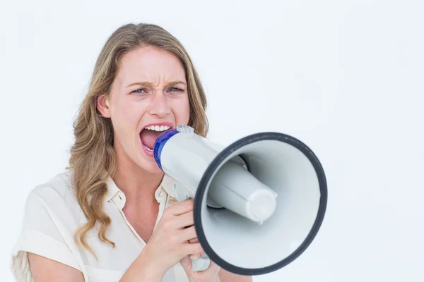 Mulher gritando através de um alto-falante — Fotografia de Stock