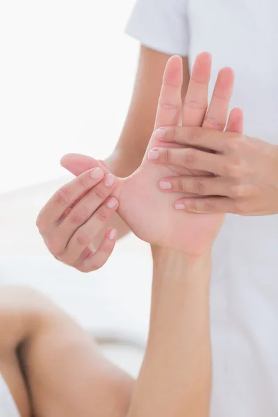 Physiotherapist doing hand massage — Stock Photo, Image