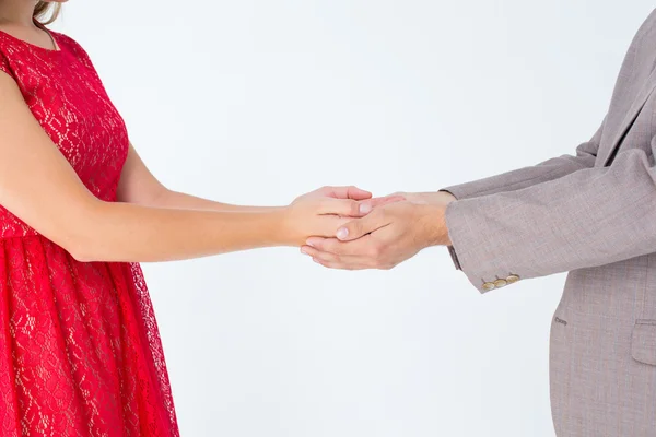 Hipster couple standing hand in hand — Stock Photo, Image