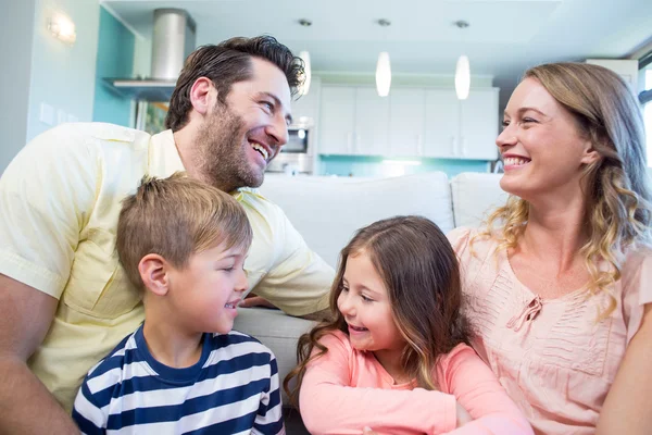 Happy family on the couch — Stock Photo, Image