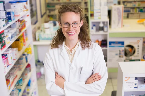 Smiling pharmacist in lab coat — Stock Photo, Image