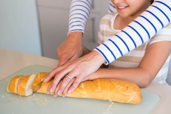 Happy family preparing lunch together — Stock Photo, Image