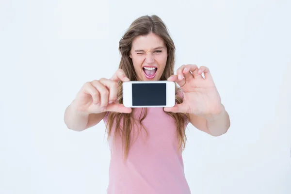 Pretty blonde taking a selfie of herself — Stock Photo, Image