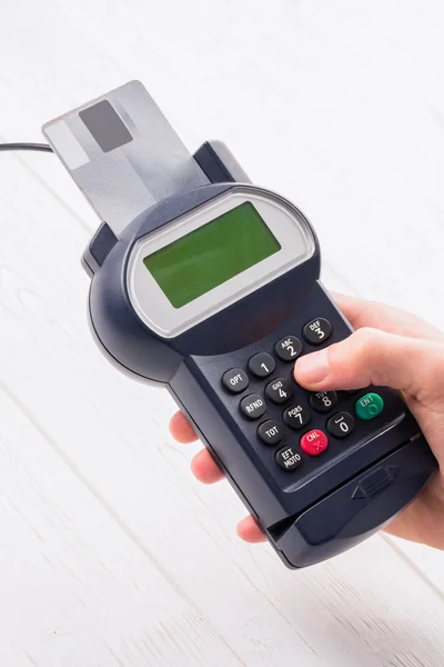 Man entering his pin on terminal — Stock Photo, Image