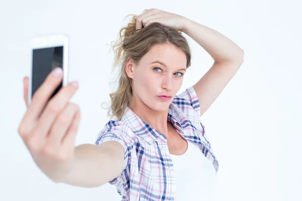 Hipster taking selfie with smartphone — Stock Photo, Image