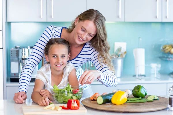 Happy family preparing lunch together — Stock Photo, Image