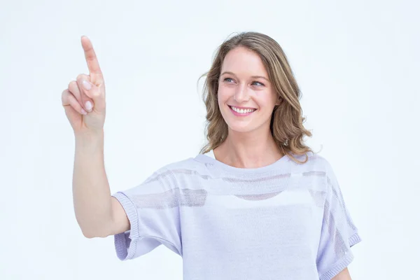Pretty woman wijzend met haar vinger — Stockfoto