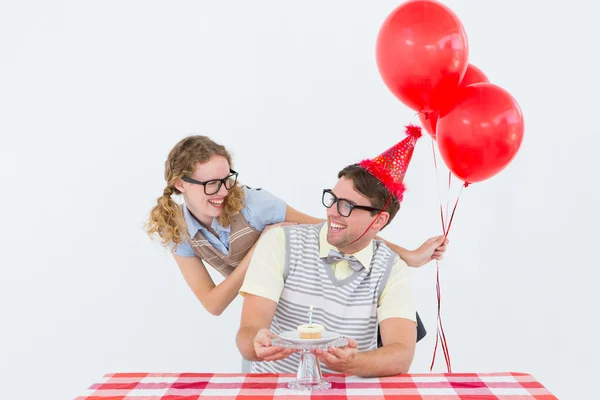 Geeky hipster couple celebrating his birthday — Stock Photo, Image