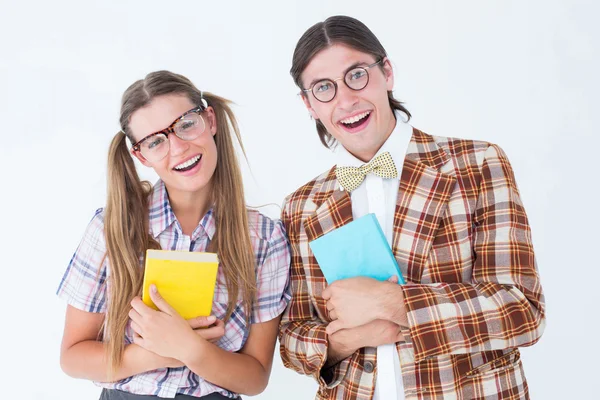 Geeky hipsters smiling at camera — Stock Photo, Image