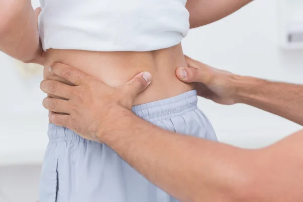 Doctor examining his patient back — Stock Photo, Image