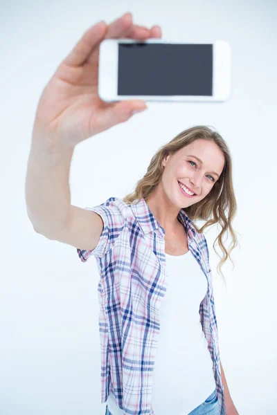 Hipster taking selfie with smartphone — Stock Photo, Image